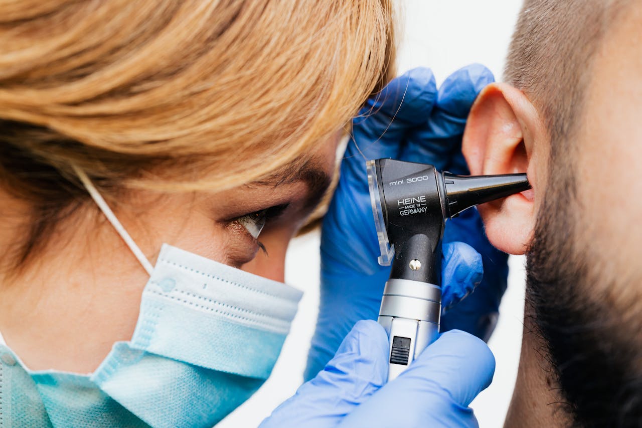 Earwax Removal and Clinical Ear Care Manchester illustration showing pharmacist-led ear care support at Manchester Chemist